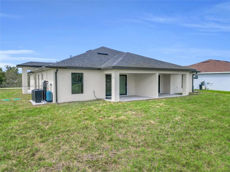 Exterior details and patio area of a home in , Lehigh Acres (Image 2). Exterior details and patio area of a home in , Lehigh Acres (Image 2).