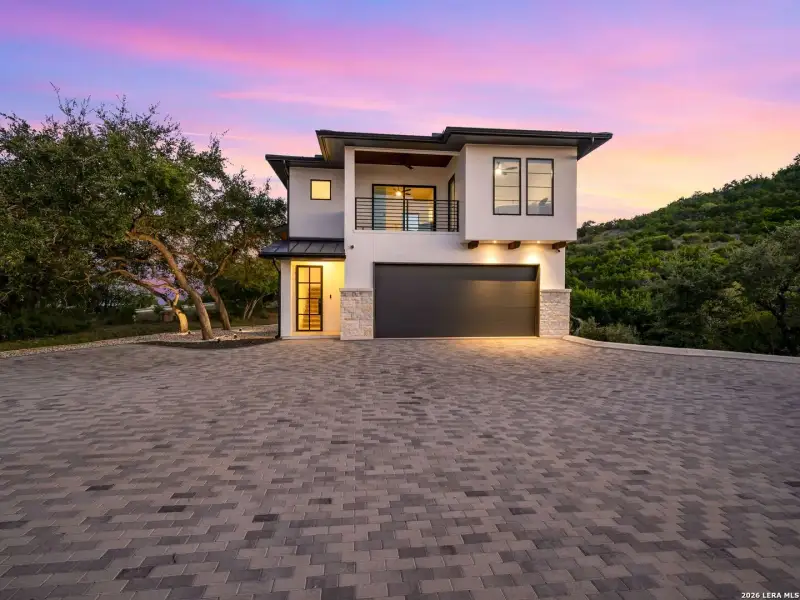 Front exterior of a new home in , San Antonio, TX, highlighting curb appeal (Image 23).