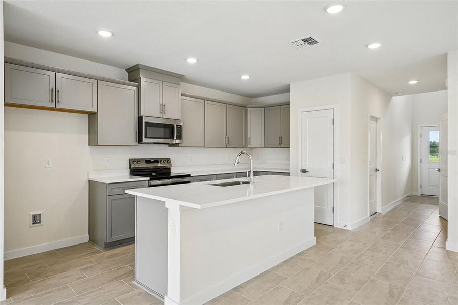Furnished interior view inside a new home in Grasslands West, Lakeland (Image 8).