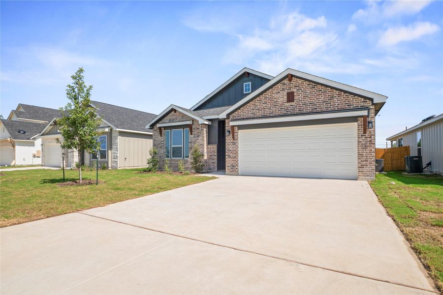 Front exterior of a new home in Rancho San Gabriel, Georgetown, TX, highlighting curb appeal (Image 18).