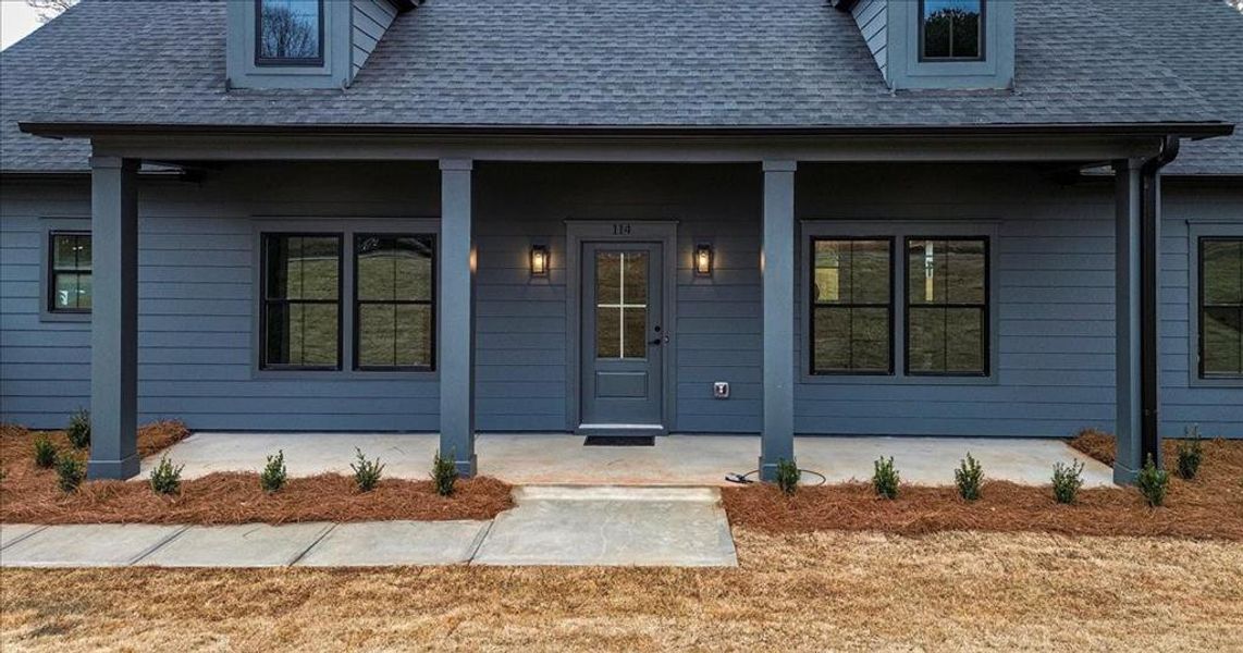 Exterior details and patio area of a home in , Monroe (Image 3).