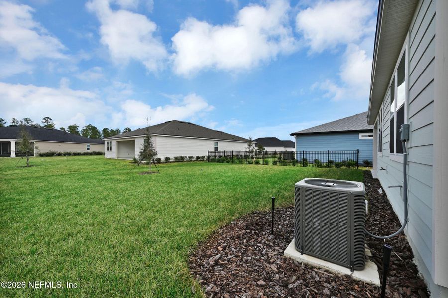 Exterior details and patio area of a home in Hyland Trail, Green Cove Springs (Image 22).