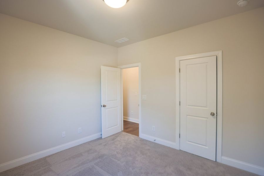 Representative unfurnished interior of a home built from the The Bennett by The Providence Group in Aberdeen, Hoschton (Image 39).