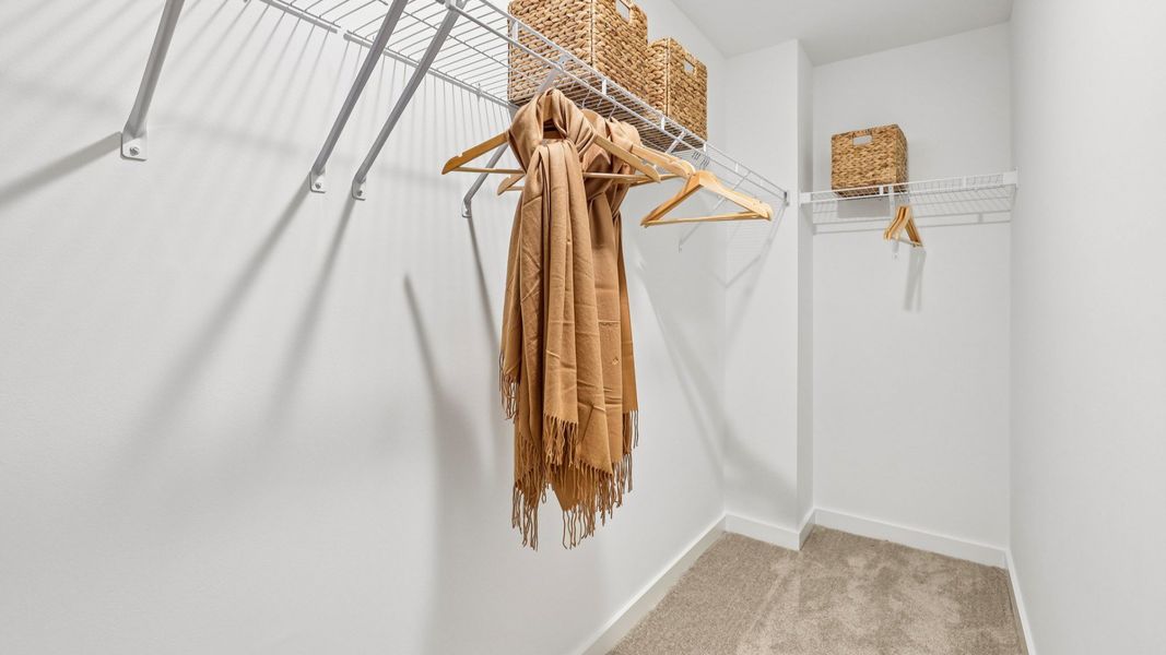 Spacious primary closet with ventilated shelf Spacious primary closet with ventilated shelf