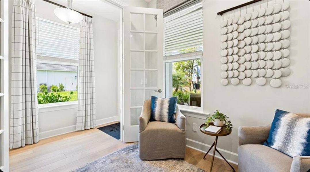 Furnished interior view inside a new home in Esplanade at Wellen Park, Englewood (Image 6).