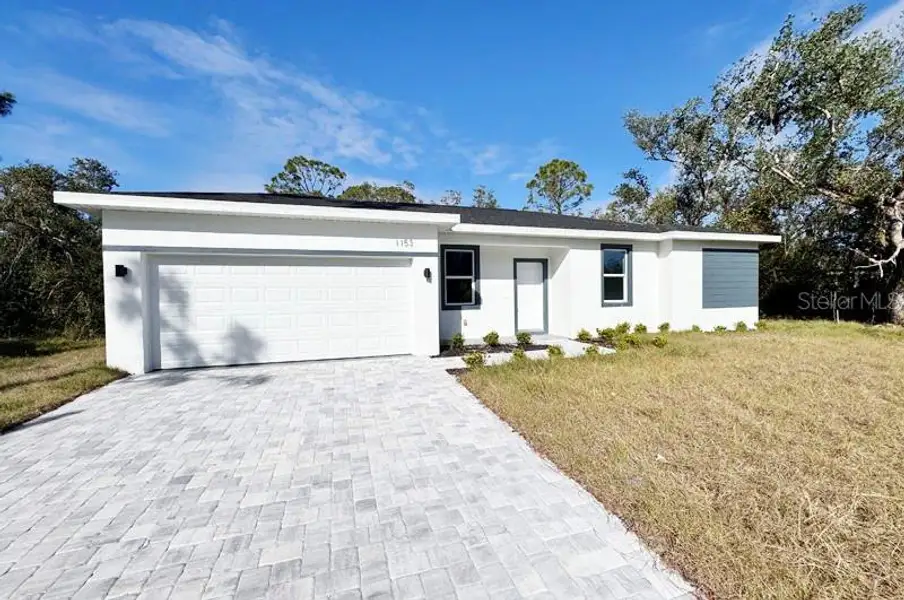 Front exterior of a new home in , Port Charlotte, FL, highlighting curb appeal (Image 16). Front exterior of a new home in , Port Charlotte, FL, highlighting curb appeal (Image 16).