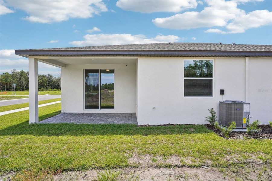 Exterior details and patio area of a home in Ridgehaven - Villas, Ormond Beach (Image 23).