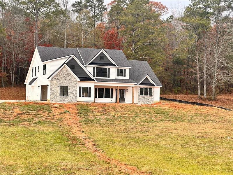 Front exterior of a new home in , Carrollton, GA, highlighting curb appeal (Image 1). Front exterior of a new home in , Carrollton, GA, highlighting curb appeal (Image 1).