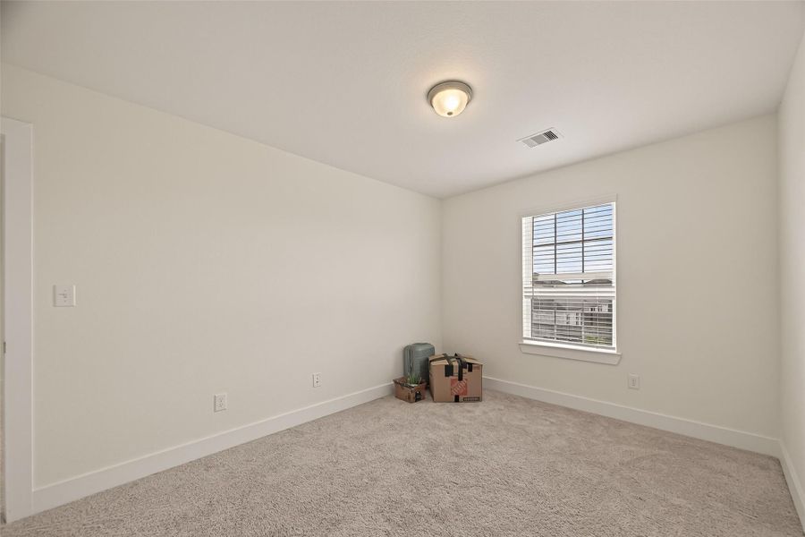 Spacious, unfurnished interior of a new home in Massey Oaks, Pearland (Image 31).