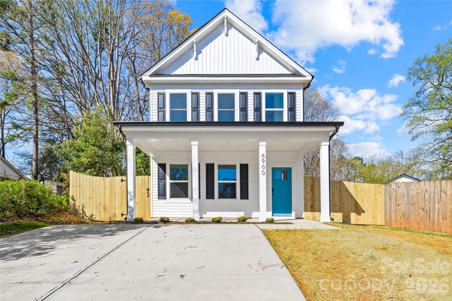 Front exterior of a new home in , Charlotte, NC, highlighting curb appeal (Image 21). Front exterior of a new home in , Charlotte, NC, highlighting curb appeal (Image 21).