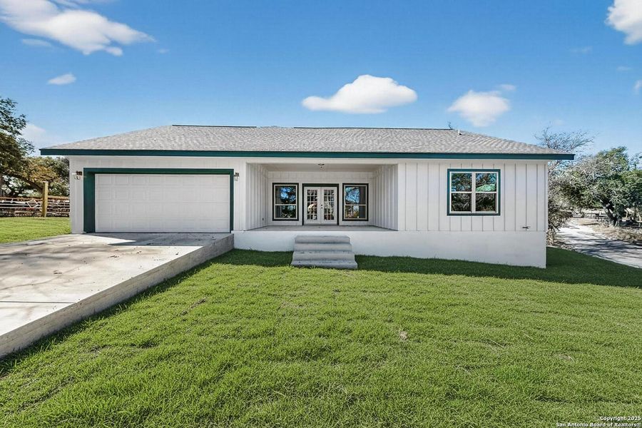Exterior details and patio area of a home in , Spring Branch (Image 27).