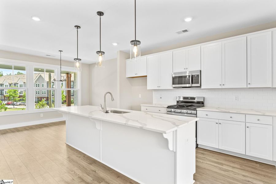 Furnished interior view inside a new home in Renaissance Place, Greenville (Image 7).