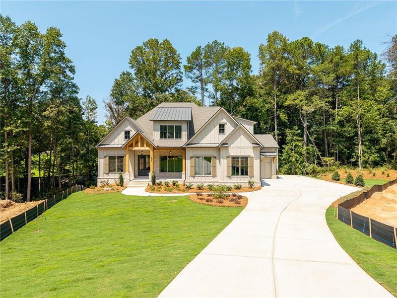 Front exterior of a new home in Malone's Pond, Ball Ground, GA, highlighting curb appeal (Image 30).