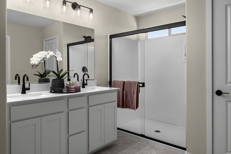 Dual-sink vanity at primary bath