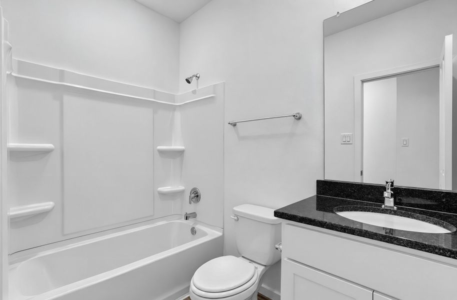 Furnished interior view inside a new home in Raburn Reserve 50s, Tomball (Image 5).