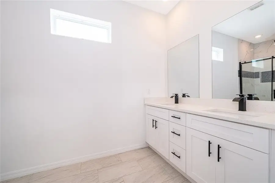 Furnished interior view inside a new home in , Kissimmee (Image 7).