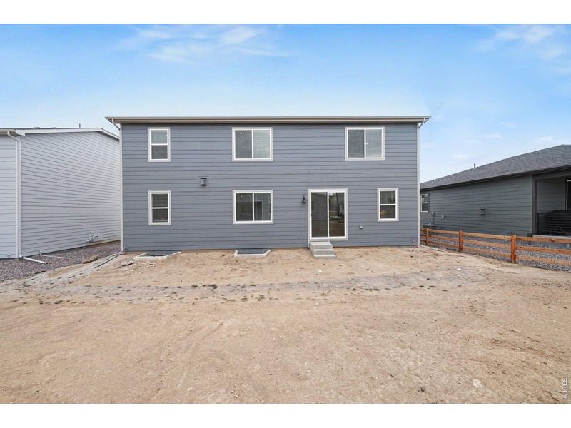 Exterior details and patio area of a home in Poudre Heights: The Alpine Collection, Windsor (Image 4).
