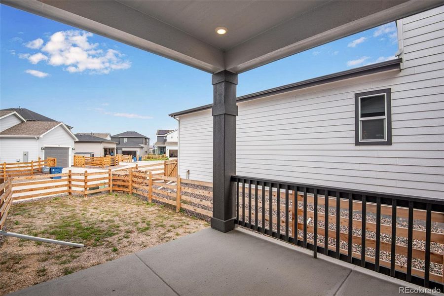 Exterior details and patio area of a home in Crescendo Collection at Reunion, Commerce City (Image 2). Exterior details and patio area of a home in Crescendo Collection at Reunion, Commerce City (Image 2).