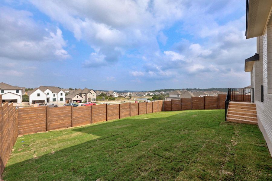 Exterior details and patio area of a home in Provence - 60', Austin (Image 29). Exterior details and patio area of a home in Provence - 60', Austin (Image 29).