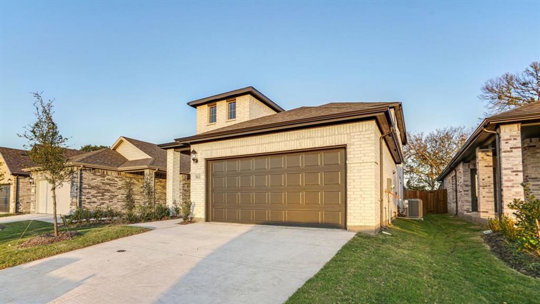 Front exterior of a new home in Eastridge - Spring Series, McKinney, TX, highlighting curb appeal (Image 20).
