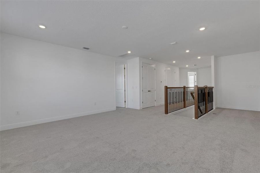 Spacious, unfurnished interior of a new home in Hawkstone, Sarasota (Image 59).