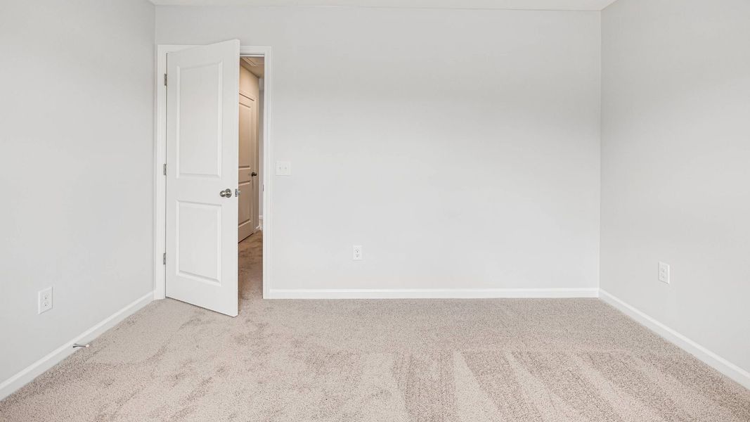 Representative unfurnished interior of a home built from the HAYDEN by D.R. Horton in Saltgrass Landing, Winnabow (Image 28).