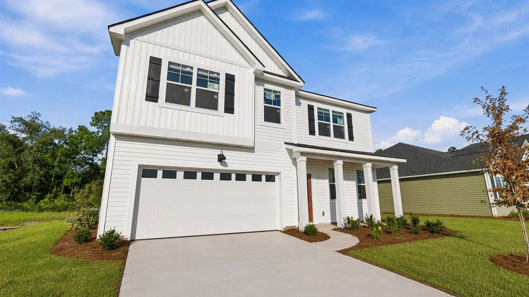 Representative exterior photo of a completed home built from the Hanover by D.R. Horton in Laurel Grove, Guyton, GA (Image 4). Representative exterior photo of a completed home built from the Hanover by D.R. Horton in Laurel Grove, Guyton, GA (Image 4).