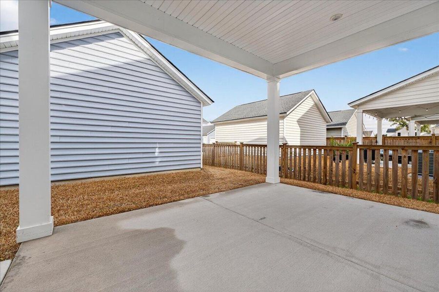 Exterior details and patio area of a home in Heron's Walk at Summers Corner, Summerville (Image 2). Exterior details and patio area of a home in Heron's Walk at Summers Corner, Summerville (Image 2).