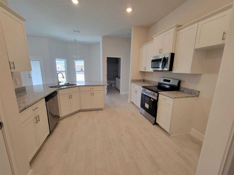 Furnished interior view inside a new home in , Ocala (Image 8).