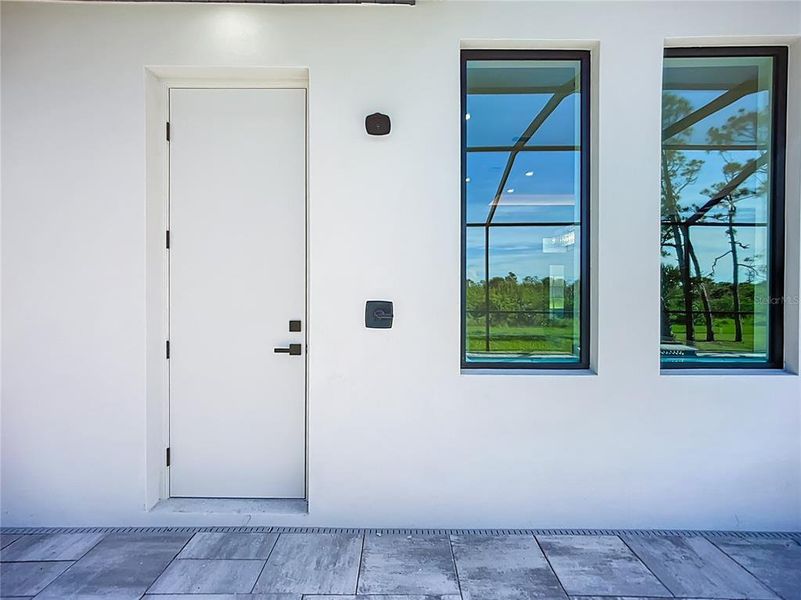 EXIT DOOR FROM 3RD BATHROOM. OUTDOOR SHOWER EXIT DOOR FROM 3RD BATHROOM. OUTDOOR SHOWER