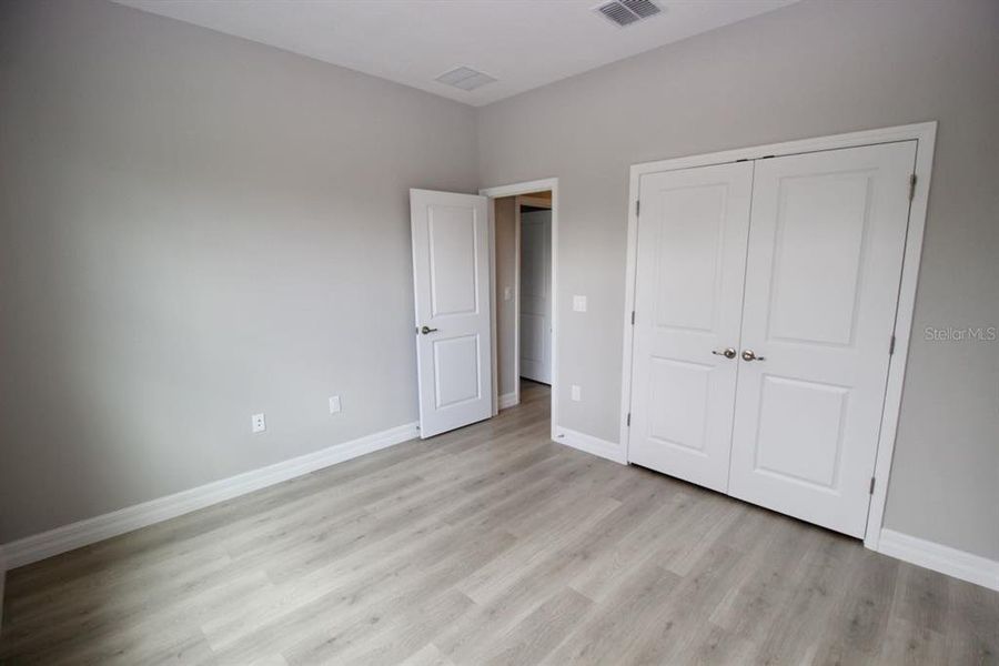 Spacious, unfurnished interior of a new home in , Port Charlotte (Image 23).