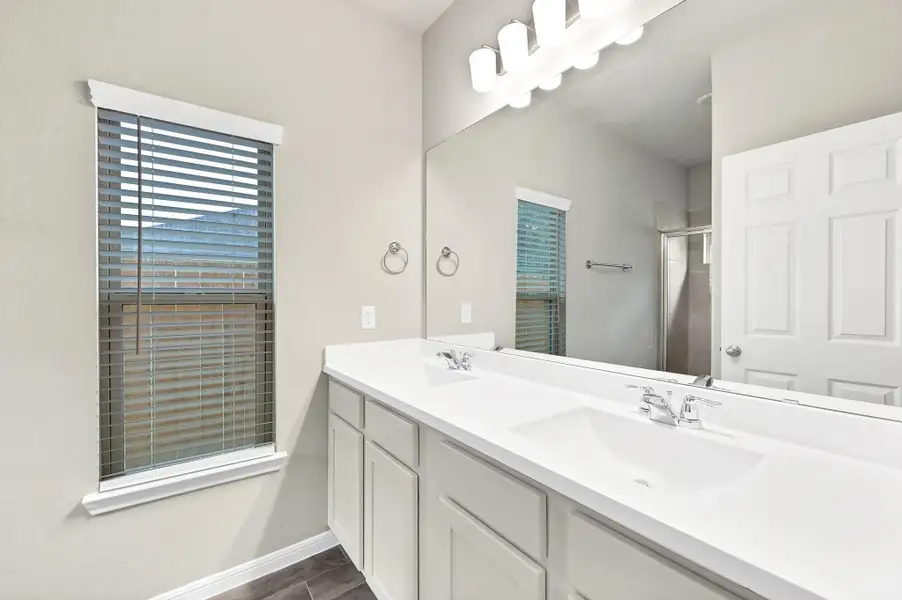Furnished interior view inside a new home in Mill Creek Trails, Magnolia (Image 8).