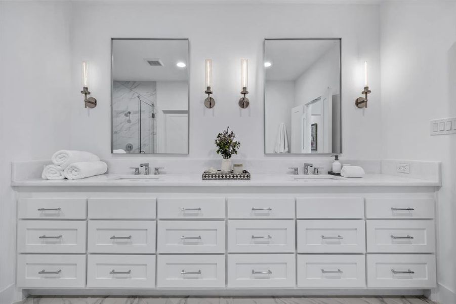 Bathroom with vanity and walk in shower