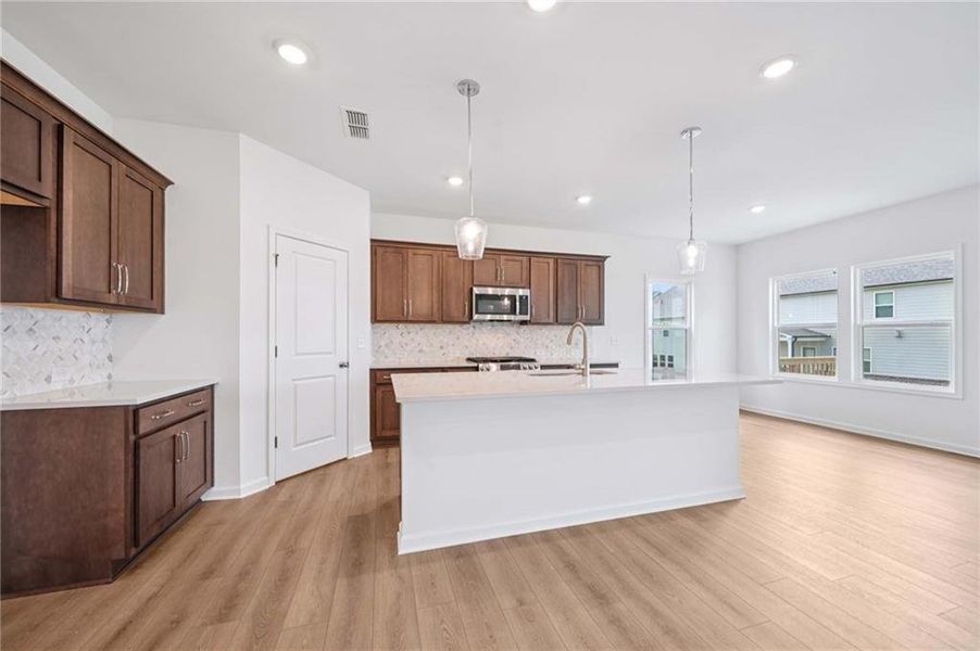 Furnished interior view inside a new home in Eastlyn Crossing, Flowery Branch (Image 11).