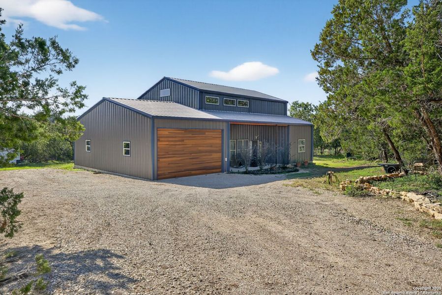 Front exterior of a new home in , Bandera, TX, highlighting curb appeal (Image 1). Front exterior of a new home in , Bandera, TX, highlighting curb appeal (Image 1).