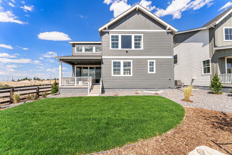 Representative exterior photo of a completed home built from the Windsor by Taylor Morrison in Macanta City Collection, Castle Rock, CO (Image 27).