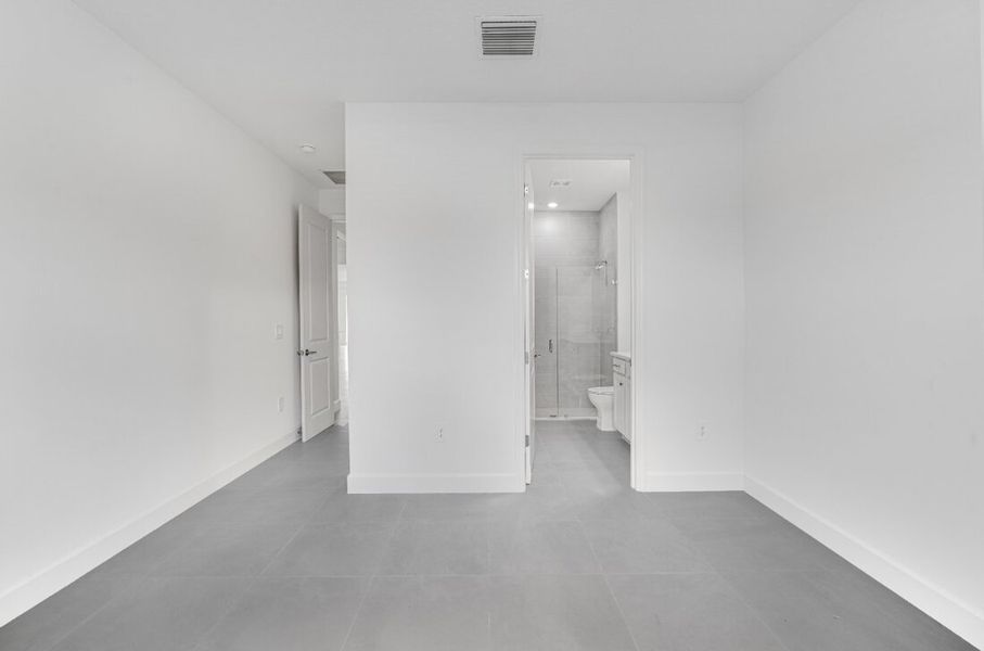 Representative unfurnished interior of a home built from the Saint Clair by Taylor Morrison in Harvest at Ovation, Winter Garden (Image 32).