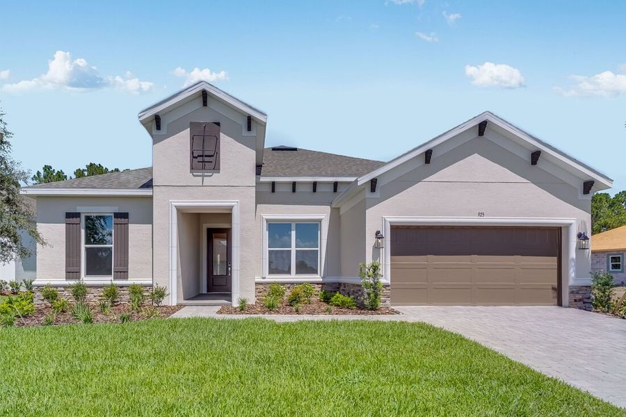 Representative exterior photo of a completed home built from the Letizia by Taylor Morrison in Esplanade at Westview, Kissimmee, FL (Image 1).