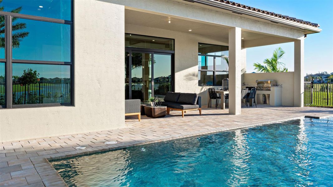 Exterior details and patio area of a home in Cresswind Palm Beach at Westlake, Westlake (Image 27).