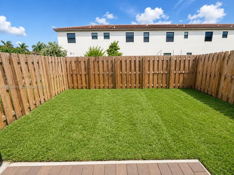 Exterior details and patio area of a home in , Miami (Image 2). Exterior details and patio area of a home in , Miami (Image 2).