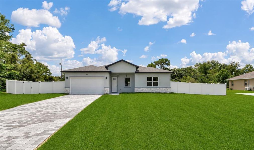 Front exterior of a new home in , Ocala, FL, highlighting curb appeal (Image 17). Front exterior of a new home in , Ocala, FL, highlighting curb appeal (Image 17).