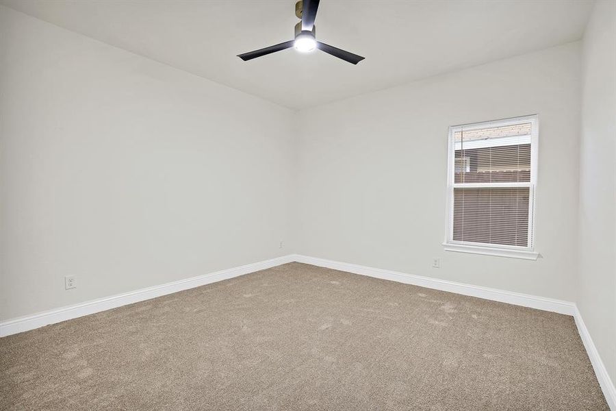 Unfurnished room featuring carpet flooring