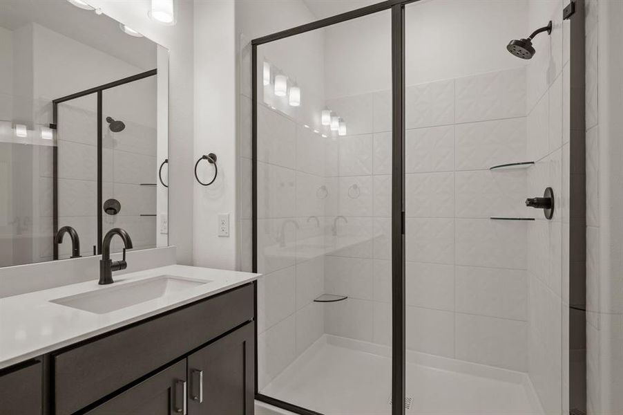 You'll find a lovely, spacious walk in shower in this dream owner's bath!