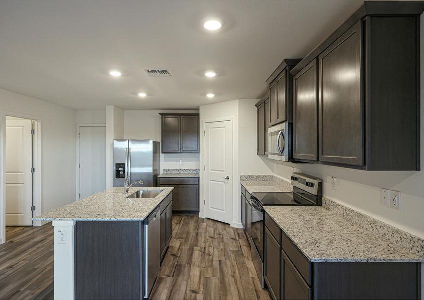 The spacious kitchen is perfect for preparing your family's favorite meals and treats.