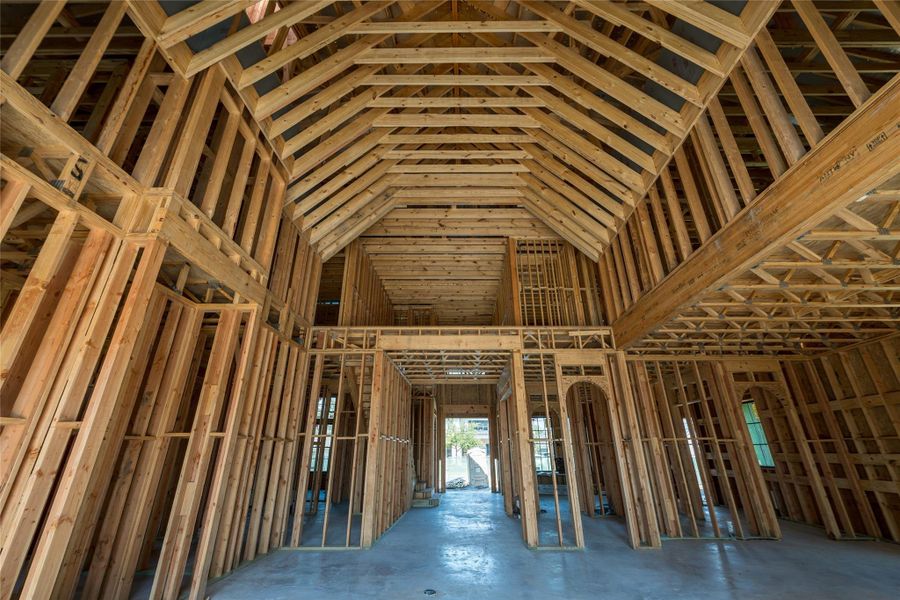 The framework of something extraordinary—soaring lines and layered depth setting the tone for a home designed to impress from the very first step.