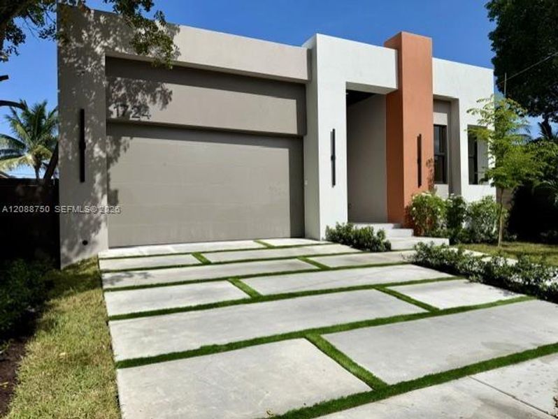 Front exterior of a new home in , Fort Lauderdale, FL, highlighting curb appeal (Image 31). Front exterior of a new home in , Fort Lauderdale, FL, highlighting curb appeal (Image 31).