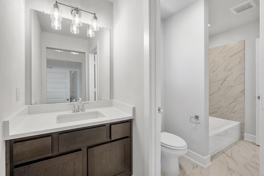 Furnished interior view inside a new home in Provence - 60', Austin (Image 12). Furnished interior view inside a new home in Provence - 60', Austin (Image 12).