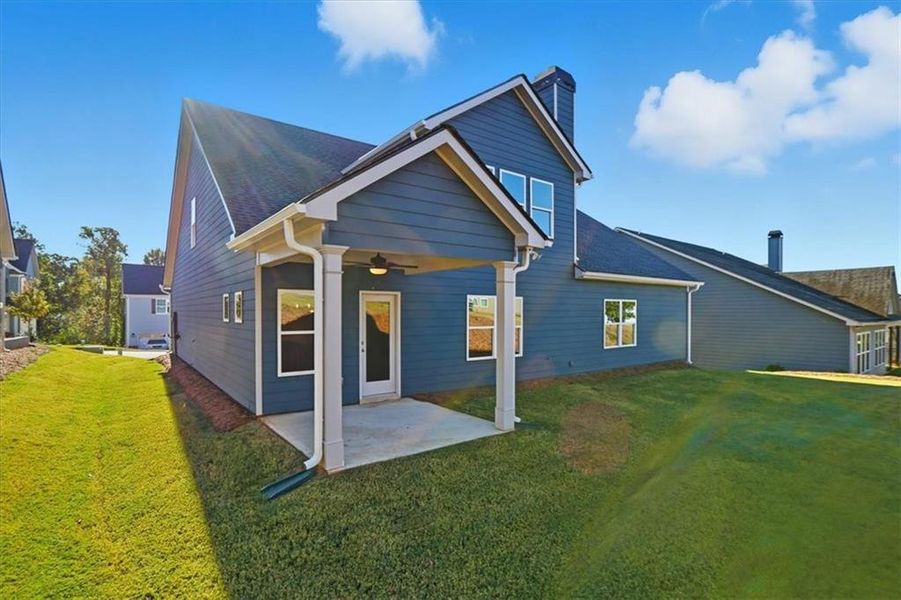 Exterior details and patio area of a home in Traditions of Braselton, Jefferson (Image 26).