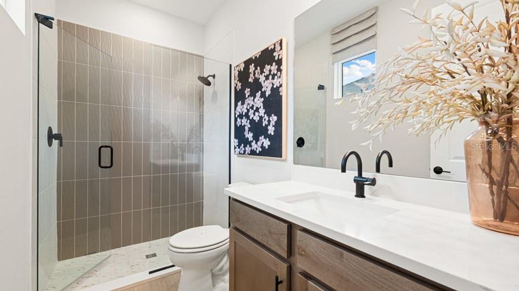 Furnished interior view inside a new home in Esplanade at Starling, Punta Gorda (Image 7).