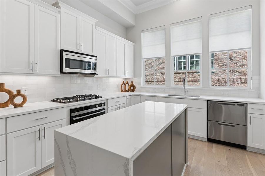 Image of model home with similar floorplan.